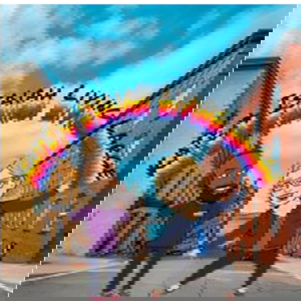 Artwork for Kate and Isaiah Living Large